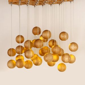 La creatività artistica nordica ha condotto la lampada a sospensione personalità dell'hotel soggiorno log palla di legno luci a sospensione a LED semplice lampadario sala da pranzo