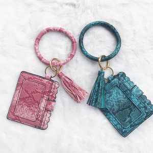 Tassels Nyckelringar Kreditkortshållare Bag PU Läder Snakeskin Korn Skriv ut Armband ID Kort Handväska med nycklar Ring Keychain Byt noll plånbok