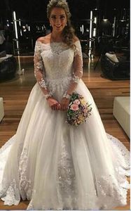 En linje elfenben bröllopsklänningar Brudklänningar 2021 Höstfjäder Nätt Lace Appliques Illusion Långärmad Elegant Robe de Mariage