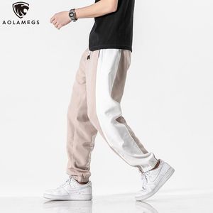 Våren nya byxor män casual patchwork träff färg sport byxor mode hajuku byxor mysiga slacks all-match