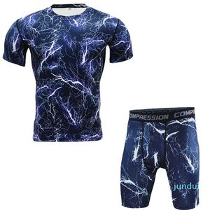 Het försäljning ny 2 -stycken män t -shirt och tights kompression set fitness workout camouflage 3d tryck mma het försäljning rashguard crossfit gym