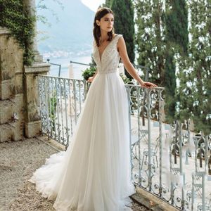 Thinyfull 2020 Nuovo Arrivo Abiti Da Sposa Perle Una Linea Con Scollo A V Abiti Da Sposa Senza Maniche Tulle Backless Bow Abiti da sposa