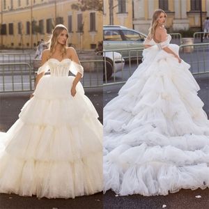 Luxury Off-shoulder Wedding Dresses Puffy Sequins Beads Tiered Tulle Wedding Gown Sexy Backless Custom Made Sweep Train Robes De Mariée