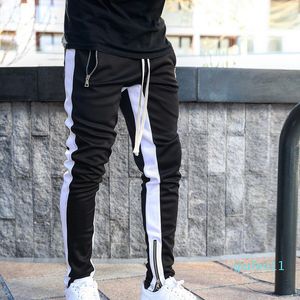 Gorąca sprzedaż-Mężczyzna Joggers Casual Spodnie Fitness Men Sportswear Dressuit Dna Skinny Spodnie dresowe Spodnie Czarne Siłownie Jogger Track Spodnie