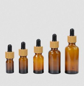 30PCS 5 10 15ml 30ml 50ml Clear Amber Glass Dropper Flaskor med Bamboo Cap 1oz Bamboos Essential Oil Bottle