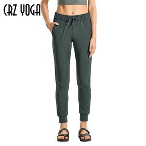 CRZ YOGA Women's Casual Travel Lounge Pants Stretch Drawstring Jogger Fitted Cuffed Sweatpants with Pockets 28 inches