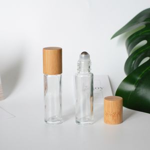 10ml Clear Glass Roller Flaskor med naturlig bambu Trä lock Kosmetisk eterisk oljull på rör Förpackning Bulk