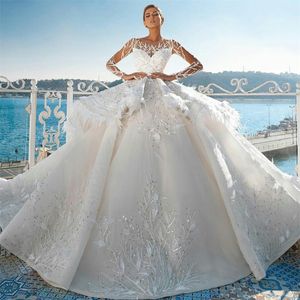 Dubai Crystal Ball Gown Abiti da sposa 2021 Plus Size Abiti da sposa Sheer maniche lunghe Piume di pizzo Vestido de novia di lusso