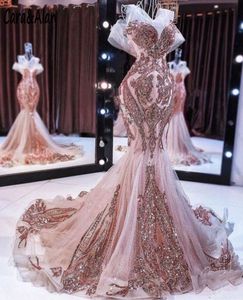 Luxury Rose Pink Mermaid Prom Dresses Appliques Lace Sequins Sparkly Long Formal Aftonklänningar för Kvinnor Glitter Sequins Train Off Axel Party Dress