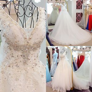 Abito da sposa su misura con scollo a V in pizzo con perline di cristallo Abiti da sposa lunghi di lusso robe de mariee Abiti da sposa 2023 Appliques in pizzo