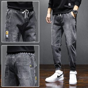 Calças de jeans de estiramento Mens Calças Casuais 2021 Outono e Inverno Nova Moda Trendy Slim Nine-Point Calças