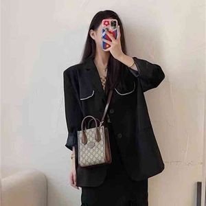 versatile printing handbag Mobile Phone Bag Small Tote and winter new women's bag Purse sale