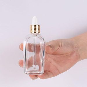 Claro transparente 20ml quadrado essencial Garrafa de conta-gotas 10ml 30ml 50ml frascos de vidro de vidro com tampa de ouro para cosméticos