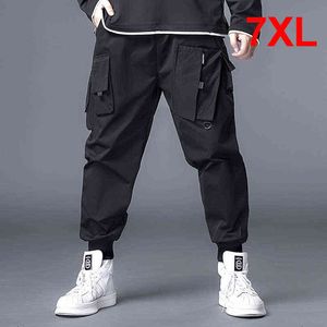 Pocket design baggy lastbyxor män svarta joggare sweatpants streetwear mode byxor man lösa bottnar stor storlek 7xl hx617 g0104