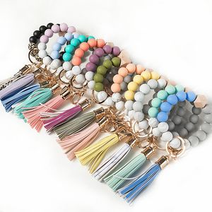 14 Kolory Drewniane Tassel Koralik Bransoletka Brelok Keychain Koraliki Silikonowe Bransoletki Kobiety Dziewczyna Klucz Breloczkowy Pasek na nadgarstek Breloki do samochodu Przenośny Łańcuch Zroszony Wristlet