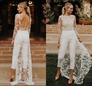 Sexig strand Öppen rygg Boho Jumpuits Bröllopsklänning Byxdräkter För Brudar Med Tåg Illusion Applikation Spets Långärmad Jumpuit För Kvinnor Bohemian Bride Klänningar