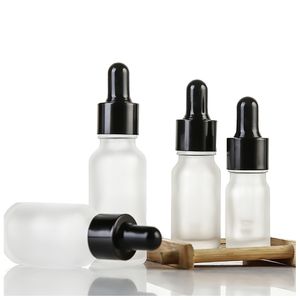 100pcs all'ingrosso 30ml bottiglia di vetro contagocce olio essenziale 10ml bottiglie di siero bianco gelo con tappo nero 5ml 10ml 15ml 20ml 100ml