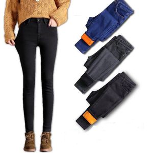 Mulheres de inverno quente jeans limitado pés espessamento veludo calças elásticas senhora calça plus size moda casual denim calças