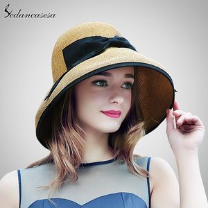 Новая летняя ширина Brim Beach Women Sun Strail Hat Элегантная кепка для женщин УФ -защита Черные боковые шляпы соломенные шляпы девушки горячие SW129001 Y200602