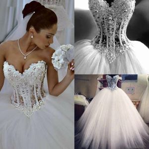 Prinsessan Sweetheart Corset En Linje Bröllopsklänning Pärlor Beaded Arabiska Dubai Lång Elfenben Bröllopsklänning Strapless Ärmlös Golvlängd Trädgård Bröllop Klänningar 2022