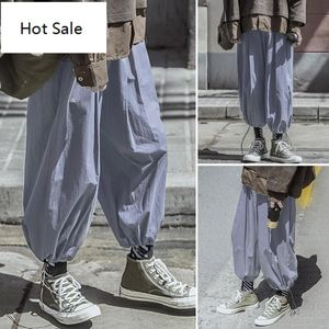 2020 Nowe Męskie Luźne elastyczne spodnie talii Lato spodnie dresowe Harem Joggers Człowiek Kieszenie Bloomers Spodnie sznurkowe 5xl