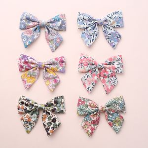 12 datorer/parti, babyflickor blommigt tryck Sailor Bow Hair Clips, Floral Fabric Bow nylon pannband, skolflicka Bow Hair Accessories LJ200903