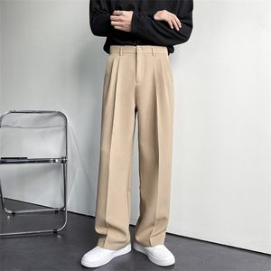 Pantalones de traje de hombre sólido holgado completo pantalón de pierna de ancho informal para caqui negro blanco japonés streetwear streetwear de gran tamaño 220212