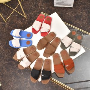 Woody Mules Sandaler Kvinnor Sandaler Designer Luxury Slipper Fahsion Lady Lettering Fabric Slide Outdoor Shoes Leather Sole Sole Flip Flops With Box