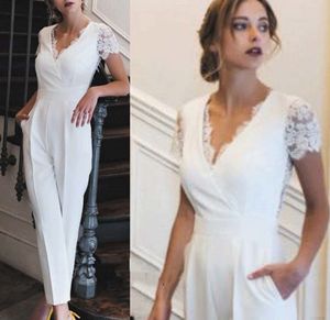 Elegant Women White Jumpsuits Prom Dresses 2021 V-neck Back Lace Illusion Formal Evening Gowns With Pockets Short Sleeves Pants Suits