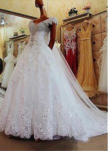 Luksusowe koronkowe kryształy sukienki ślubne Zastosowane kwiaty z ramion ślubnych suknie ślubne Train Vestidos de novia 2021 Nowa szata de Mariage