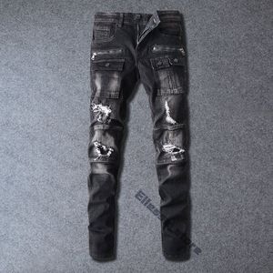 Mens Designer Jeans nödställda rippade cyklist Slim Fit Motorcykelcyklister denim för mäns mode mans svarta byxor häll hommes