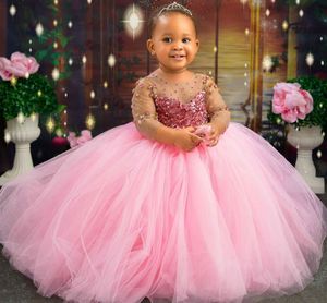 Różowe kryształy kwiatowe sukienki dla dziewczynek przezroczysta szyja długie rękawy mała dziewczynka suknie ślubne tanie komunia suknie na konkurs piękności suknie F218