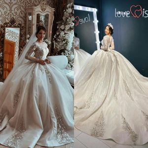 Modest bollklänning 2021 Bröllopsklänningar Fullständiga ärmar Lace Beaded Jewel Neck Brudklänningar Vintage Arabic Plus Storlek Robes de Mariée Al7191