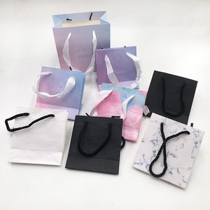 Beautiful empty soft paper handbag custom private logo packaging for 16mm-25mm long eyelashes mink lashes vendor