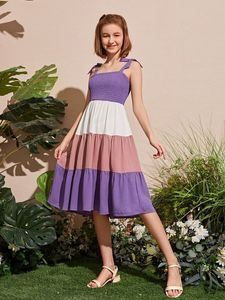 十代の女の子シールフリル裾ノット詳細カラーブロックドレス