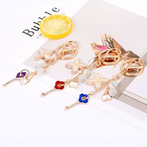 Crystal Keychain Rhinestone Smycken Fyra Leaf Clover Bil Pendant Girl Kvinnor Key Rings Creative Cute Flower Keyring Gift