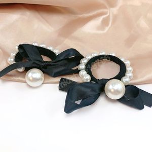 Super Fairy Pearl Bow Haarring Nische High-End-Haarbänder Retro Elegante Gummi-Kopfseil-Kopfbänder für Frauen