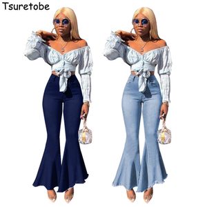 Tsuretobe Plus Size Flare Jeans Women Vintage High Waist Jeans Ladies Tassel Bell Bottom Jeans Slim Stretch Denim Wide Leg Pants 201012