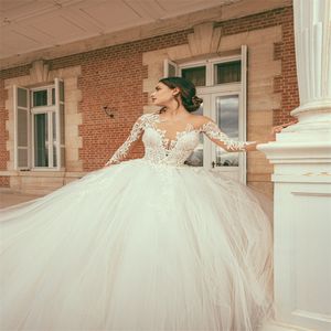 Långärmade Ballroom Bröllopsklänningar Lyx Dubai Sexig Illusion Appliqued Lace Bridal Gown Ruffle Tulle Court Train Robes de Mariée