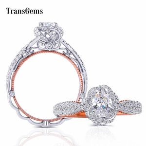 Transgems 14K 585 White Rose Gold Center 0.6CT 4X6mm GH Color Oval Moissanite Anello di fidanzamento Twist con accenti per le donne Y200620