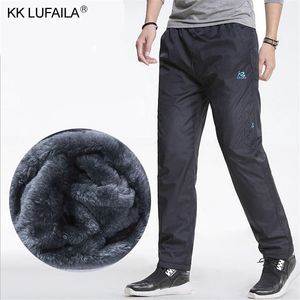 Men's Winter Super Warm Pants Fleece Thick Trousers Outdoors Thermal Waterproof Pants Zippers Fitted Sweatpants Joggers Men 3XL 201006