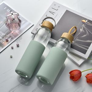 21OZ Wasserflaschen aus Borosilikatglas mit auslaufsicherem Bambusdeckel und Silikonhülle