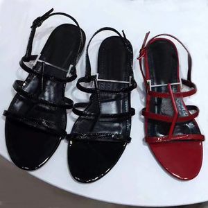 Sommar ny produktdesigner sandaler mode läder damer sko romersk platt botten strand loafers metall knapp sexig bankett kvinnor skor stor storlek US4 US10