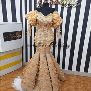アフリカのゴールドマーメイドのウエディングドレス3D花オフショルダーロングスリーブプラスサイズのローブデュレオフィルパーティーガウン