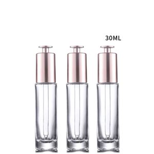 Hot Sale Market 30ml Clear Glass Dropper Bottles Press Cosmetic Essential Oil Dropper Bottles With Rose Gold Cap