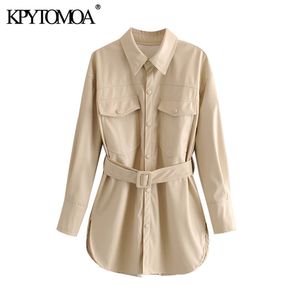 Kpytomoa النساء أزياء بو فو الجلود مع حزام سترة معطف خمر طويلة الأكمام فتحة الجانب الإناث قميص شيك القمم 201028