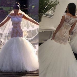 2021 Graceful Boat Neck Lace Mermaid Wedding Dresses Buttons Back Nude And Ivory Off Shoulder Trumpet Country Garden Bridal Gown Mariage