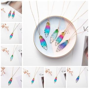 Hängsmycke Necklaces Fantisy Tale Neon Color Resin Cicada Wing Necklace för kvinnor Flickor Sequin Rainbow Folie Butterfly Tillbehör