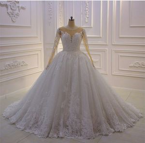 2021 Elegant Ball Gown Wedding Dresses Sheer Jewel Neck Long Sleeve Princess Bridal Gowns Sparkly Sequins Wedding Dress robes de mariée
