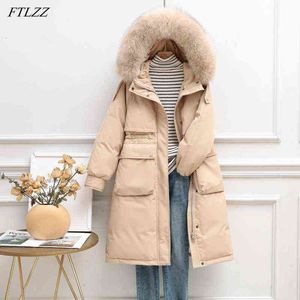 FTLZZ冬の女性ダウンロングジャケット大型自然の毛皮のカラーフード付きコート90％ホワイトアヒルダウンパーキング厚さ雪の暖かいoutwear 211221